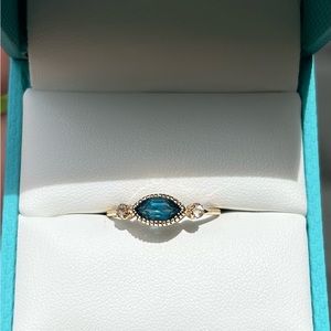 London Blue Topaz stacking ring in 14k gold.